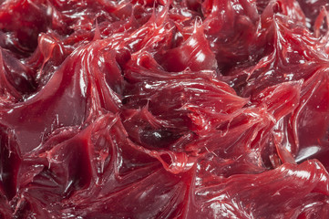 Red Automotive Grease Close-up shot of special grease used in extreme pressure situations