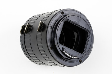 Intermediate ring for macro photography on a white table. Photo accessories for photographic...