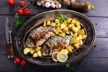 Fried bream fish with potatoes