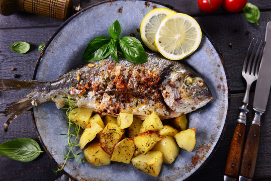 Fried bream fish with potatoes
