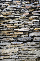 Brick wall old Scottish castle in the town of Kirkwall on the background of blue sky.