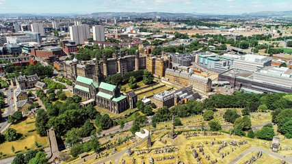Aerial image over Glasgow Necropolis, a Victorian garden cemetery, and the medieval Cathedral.