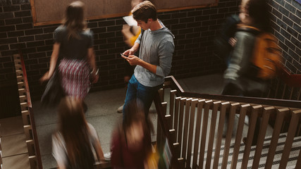 Students on steps of college campus © Jacob Lund