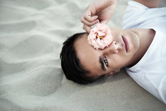 Man holding rose flwer