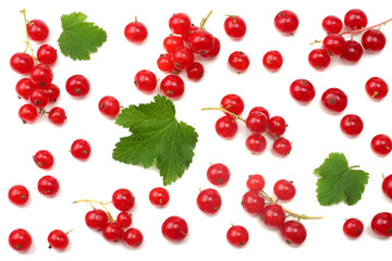 red currant with green leaf isolated on a white background. healthy food. top view