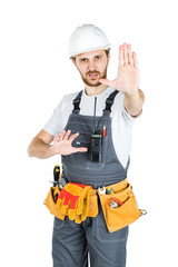 A construction man shows a stop sign. isolated on white background
