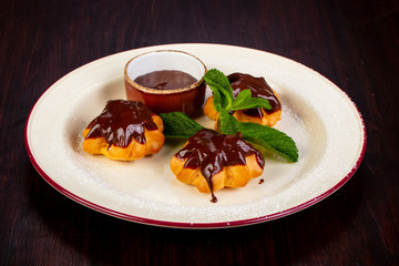 Profiteroles with chocolate