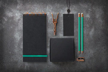 dark elegant branding / identity mockup with blank notebook, black cardboard box for packaging...