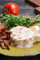 French soft cheeses, variety of different taste goat milk natural cheeses on granite plate close up sesrved as dessert
