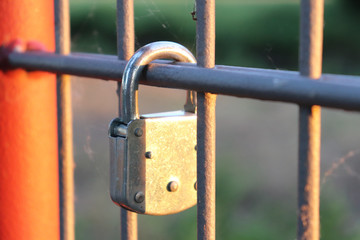 old lock on fence 