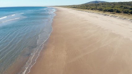 Deserted sandy beach aerial drone footage ocean seascape - Powered by Adobe