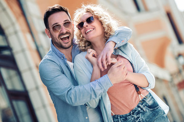 Happy young couple having fun outdoors