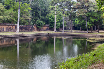 Pond in Angkor Thom park, Angkor Wat complex, Cambodia. Green park lake of Angkor Thom internal yard.