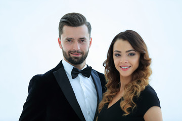 Portrait of a handsome man looking at the camera with a woman