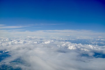 Naklejka na ściany i meble View from above clouds