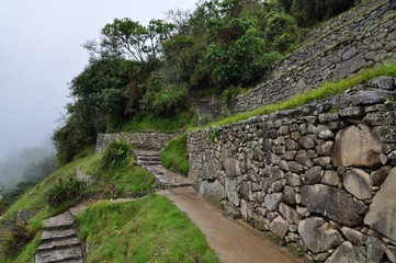 Fototapeta na wymiar old stone steps in Machu picchu