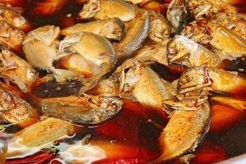 Boiled fish sauce at market