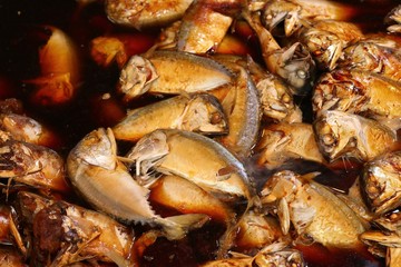Boiled fish sauce at market