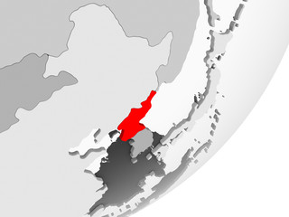 Fototapeta na wymiar North Korea in red on grey map