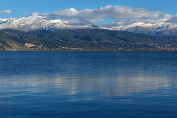 Amazing winter Landscape of Lake Pamvotida and Pindus mountain from city of Ioannina, Epirus, Greece
