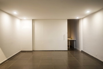 Empty room with white walls