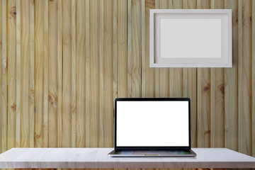 Mockup laptop on white desk. Blank screen laptop for graphic display montage.