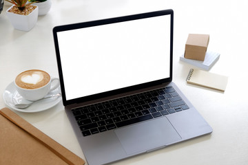 Mockup blank screen laptop on desk.
