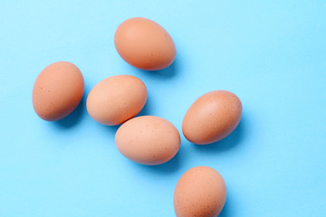Top view of six raw eggs