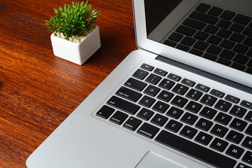 Office desk table with computer and supplies
