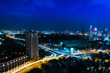 Fototapeta premium Ho Chi Minh City/ Vietnam: Downtown Saigon from the above view, aerial view at dusk, royalty high quality free stock image view from above of Ho Chi Minh City/ Saigon