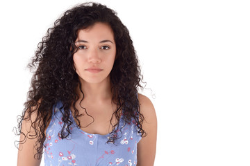 Portrait of young latin woman in a studio.