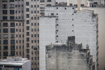 Pollution on old aged buildings of the megalopolis in downtown San Paolo, Brazil.