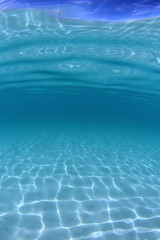 Clear blue water background in ocean   