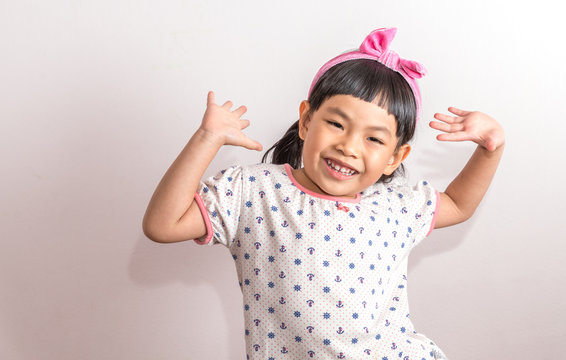 Portrait Of Child Acting Very Happy