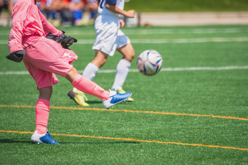 Obraz premium Sceneria meczu piłki nożnej młodzieży