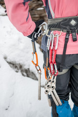 Set of slings on a  harnesses in sportsman ice climbing