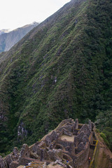 Ancient stone ruins of an Inca town on the Inca Trail in the Andes mountains. Cusco. Peru. South America. No people.