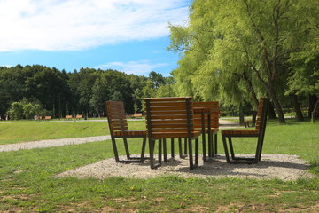Chess board tables in city park. Picnic area in  public park.