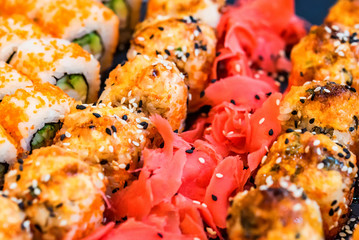 Japanese sushi rolls and ginger close