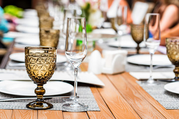 Served tables at outdoor restaurant