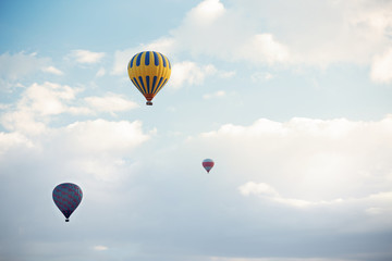 Three air balloons flying in the sky