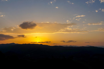 landscape of clouds sky sunset over mountains