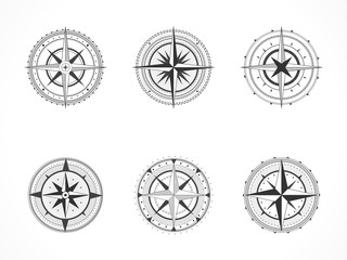 Vector set of vintage compasses or marine wind roses. Collection in line art style. Black line. Isolated on white background.
