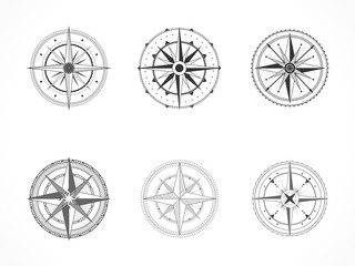 Vector set of vintage compasses or marine wind roses. Collection in line art style. Black line. Isolated on white background.