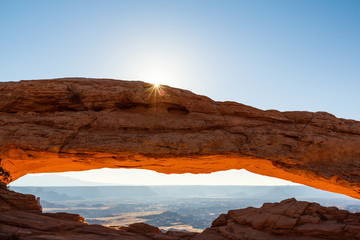 Fototapeta na wymiar Beautiful sunrise scenery at Mesa Arch, Arches National Park, Utah, on a clear summer day