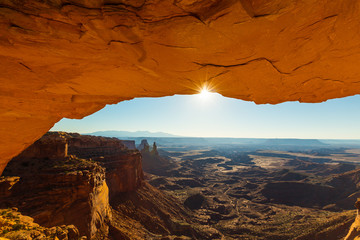 Beautiful sunrise scenery at Mesa Arch, Arches National Park, Utah, on a clear summer day