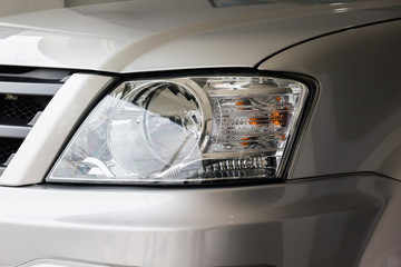 Focused at new headlamp of blond car © kazitafahnizeer