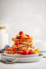 French toast with berries and syrup, vertical. Healthy vegan food concept.
