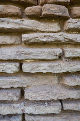 Vertical view of an old brick wall texture. No people.