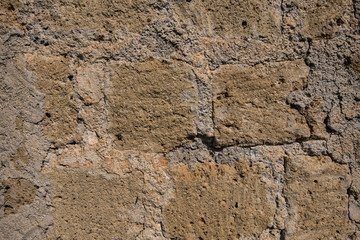 Beautiful wallpaper background of a wall made giant concrete bricks. No people.